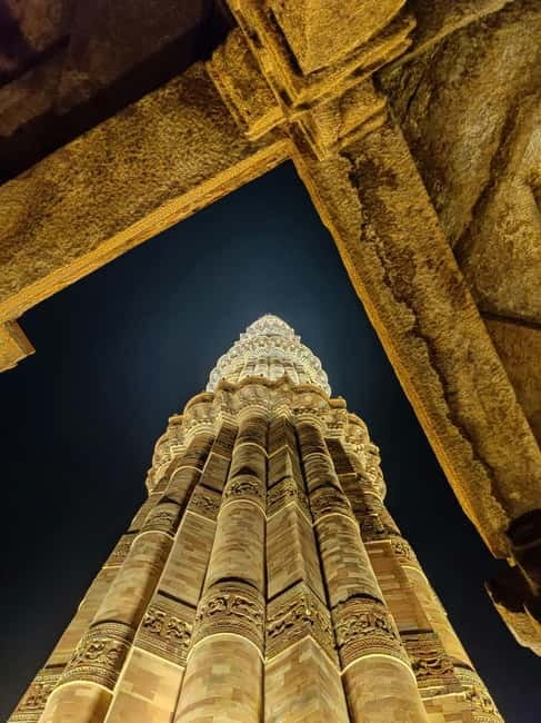 Delhi: Evening City Tour with Private Guide By Car - India Gate after dark: memorial, crowds, and the right kind of energy