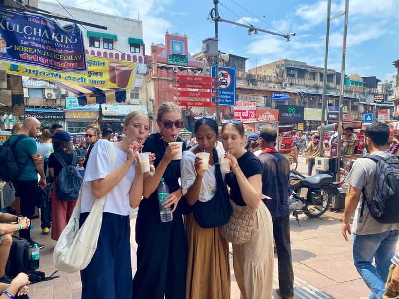 Delhi: Old Delhi's Street Food, Temples & Spice Market Tour - Old Delhi Sights on Foot and by Rickshaw: Mosque Views, Red Fort From Outside, and Street-Level Photos