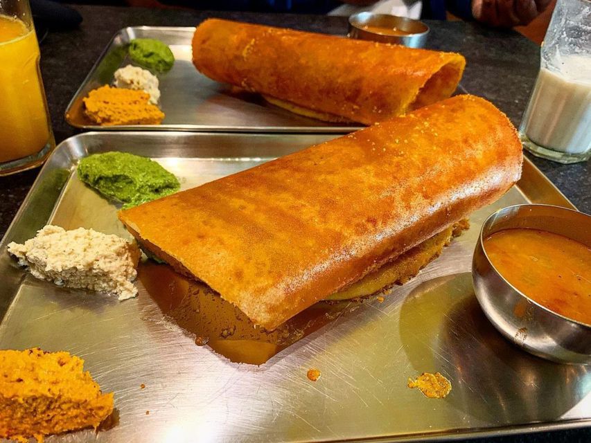 Delhi Street Art Tour: Explore the Murals & Visit a Stepwell - The Morning Rhythm: Golden Bakery to City Lanes