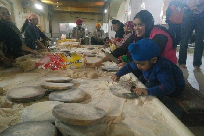 Explore the Beauty of Old Delhi & the Spice Market! - The paratha snack and bottled water: small included extras, big comfort