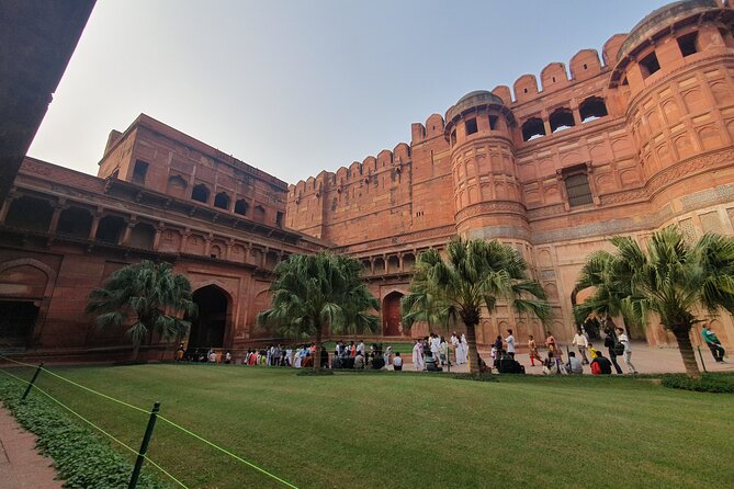 From Delhi: Sunrise Taj Mahal Tour with Professional Photographer - Pickup in New Delhi and the AC car reality check