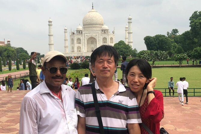 From Delhi : Taj Mahal Luxury Tour Package by Car - Agra Fort: red sandstone, UNESCO status, and Taj views