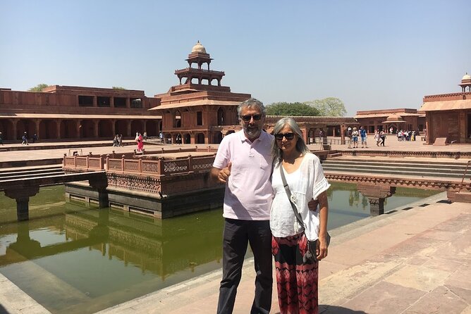 Luxury Taj Mahal Tour By SUPERFAST Train From Delhi - Agra Fort at 1:00 PM: red sandstone, power, and photo-friendly structure