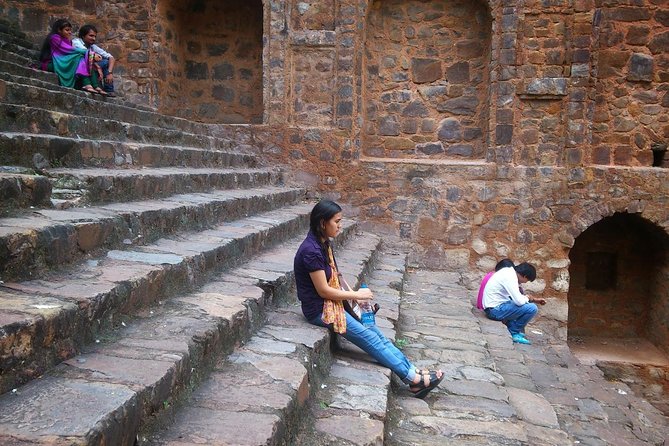 Moral Slum Tour in Delhi with hotel pickup & drop - Agrasen ki Baoli: the symmetrical stepwell reset after the slum visit