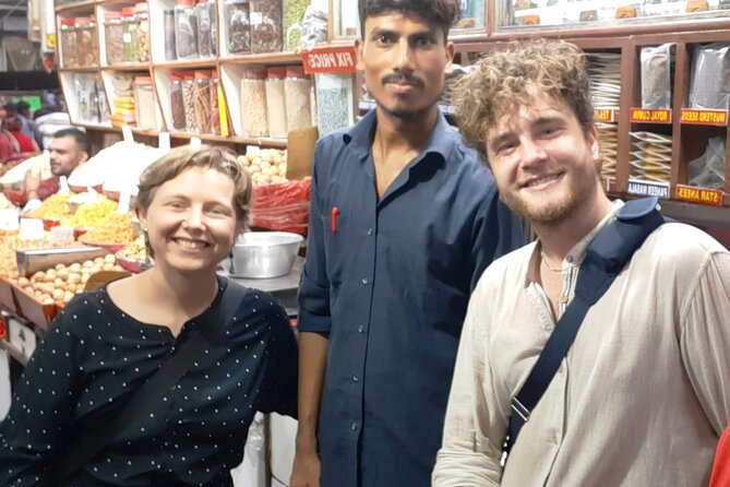 Old Delhi's heritage, Spice market, Masala Chai & food sampling - Stop 2 in Kinari Bazar: samosa in an ancient snack corridor
