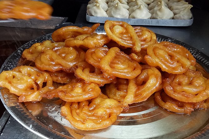 Old Delhi Street Food Tour with TUK-TUK Adventures - Pickup, briefing, and the Pasar Chandni Chowk starting point