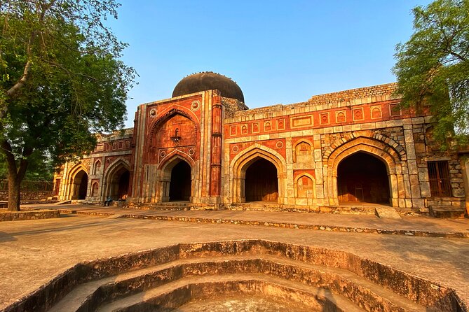 Premium Hidden Jewels of Delhi Cycling Tour - The First Chapter of Delhi - Mehrauli Archaeological Park: stepwell, mosque, and big stone views