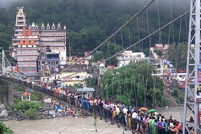 Private Day Trip to Haridwar and Rishikesh from Delhi by Car - Ram Jhula: pedestrian bridge with bikers too