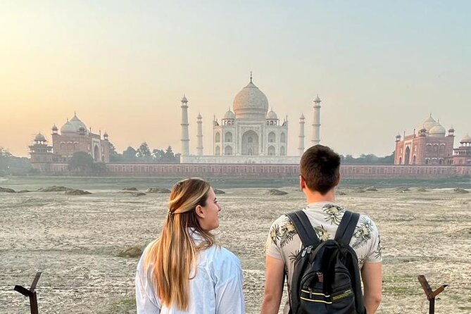 Private Taj Mahal Sunrise Tour from Delhi - Standing in front of the Taj Mahal in soft morning light