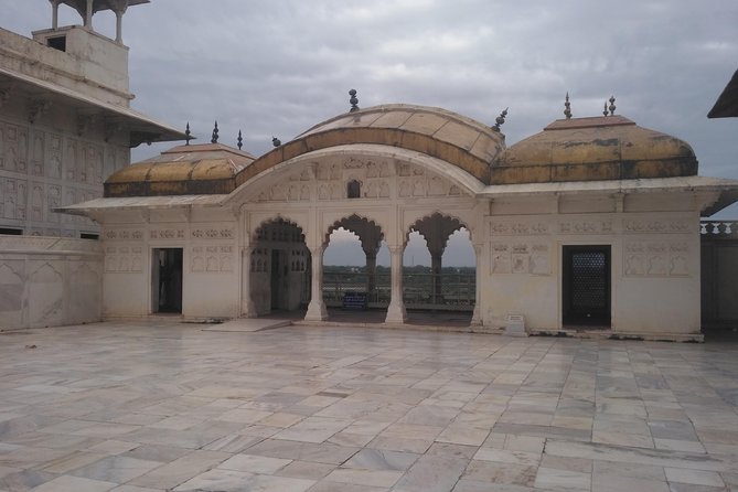 Taj Mahal, Agra Fort, & Fatehpur Sikri Day trip From Delhi by car - Marble Handicrafts Agra: a short craft stop with real people behind it