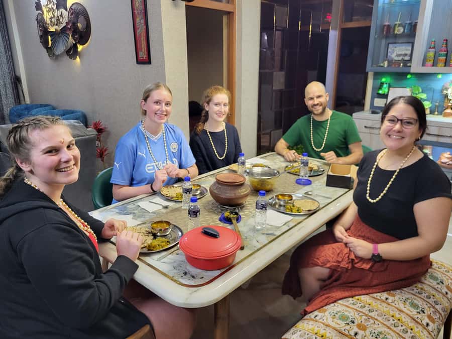Talk & Enjoy with Delhi locals at their home while Cooking - Learning Hindi the friendly way: phrases, couch time, and real questions